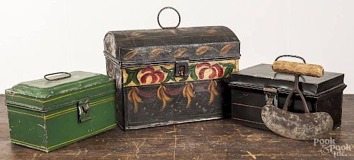 Three toleware boxes, 19th c., largest - 7 1/2'' h., 10 1/4'' w., together with a steel dough cutter.
