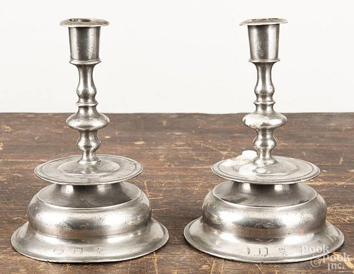 Pair of English pewter bell base candlesticks, 18th c., 6 1/2'' h.