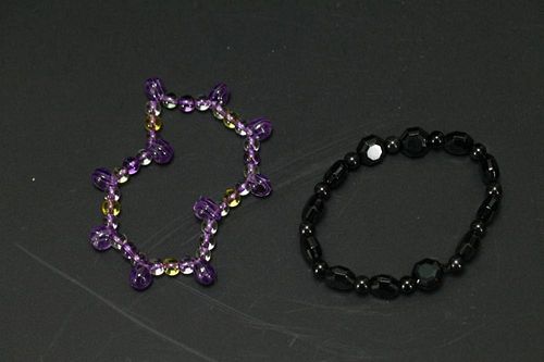 2 Pieces of Chinese Crystal Bracelets