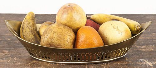 Eight pieces of wax fruit, 19th c., in a pierced brass tray.
