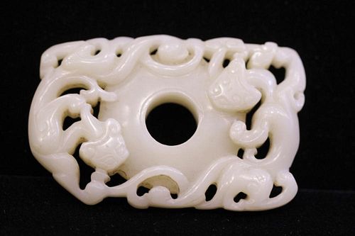 A FINELY CARVED WHITE JADE TWO-CHI DRAGON DISC, BI