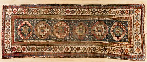 Kazak carpet, ca. 1930, 10'3'' x 4'.