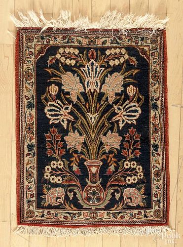 Persian carpet, 2'3'' x 1'8''.