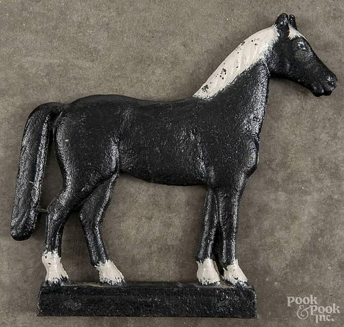 Dempster painted cast iron log-tail horse windmill weight, ca. 1900, 16 1/2'' h., 18'' w.