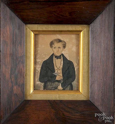 Miniature watercolor portrait of a boy holding a quill, 19th c., 4'' x 3 1/4''.