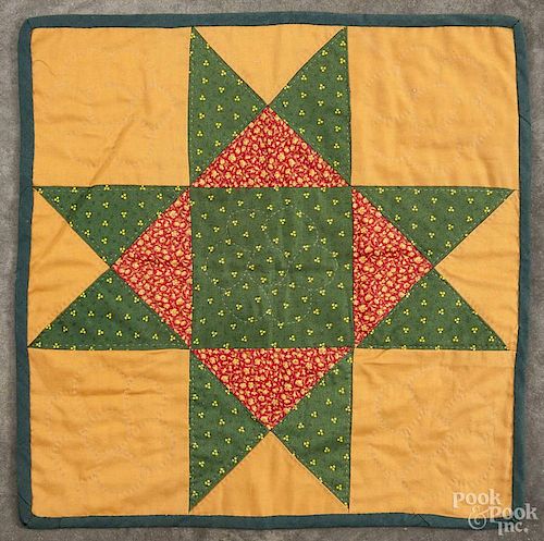 Pennsylvania patchwork star variant doll quilt, 20th c., 15'' square.