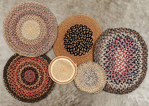 Six braided mats, early 20th c., largest - 18'' w.