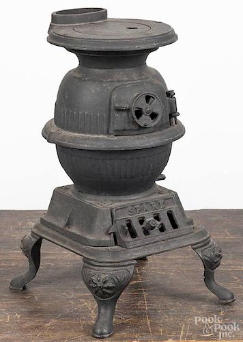 Grey Iron cast iron toy pot belly stove, early 20th c., inscribed Spark, 13 3/4'' h.