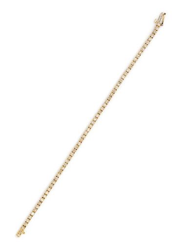 A 14 Karat Yellow Gold and Diamond Line Bracelet, 6.40 dwts.
