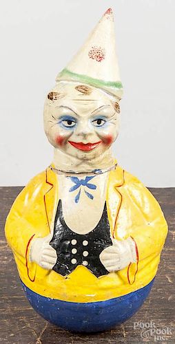Two composition clown roly poly toys, ca. 1930, 12 1/2'' h. and 10'' h.