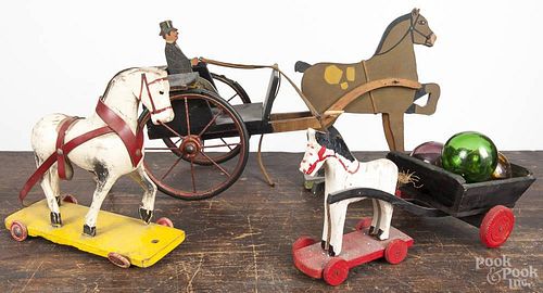 Painted wood cut out of a horse drawn doctor's cart, early 20th c., 17 1/2'' l., together with a hors