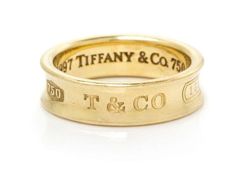 An 18 Karat Yellow Gold "Tiffany 1837" Band, Tiffany & Co., Circa 1997, 5.45 dwts.
