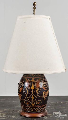 Greg Shooner redware table lamp, signed and dated 2002, with slip tulip decoration, 10 1/2'' h.