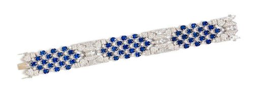 An 18 Karat White Gold, Sapphire and Diamond Bracelet, 38.20 dwts.