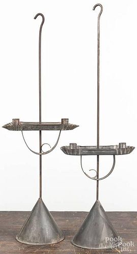 Two contemporary tin table top candleholders, 28 1/2'' h. and 19 1/2'' h.
