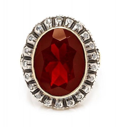 A Silver Topped Yellow Gold, Diamond and Garnet Ring, 6.20 dwts.