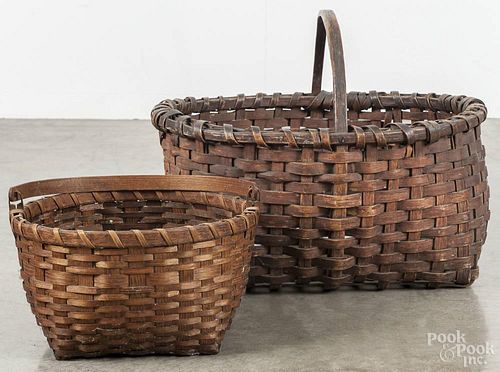 Two splint gathering baskets, 19th c., one with a swing handle, 16'' h., 20'' w. and 8'' h., 12'' w.