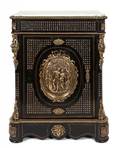 * A Napoleon III Ebonized, Mother-of-Pearl Inlaid, and Gilt Metal Mounted Cabinet Height 44 x width 34 x depth 16 inches.
