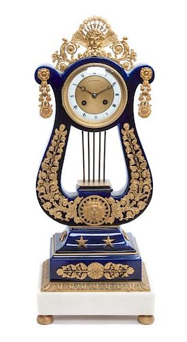 A Sevres Style Ormolu and Porcelain Clock Height 21 3/4 x width 8 1/2 x depth 6 inches.