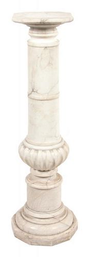 A Continental Carved Marble Pedestal Height 43 inches.