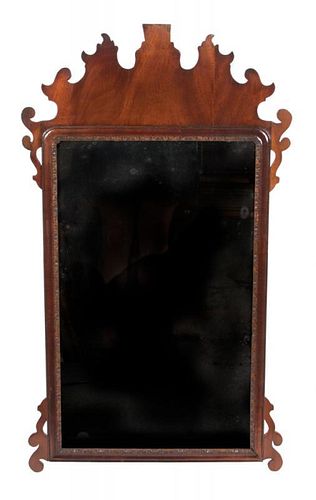 Two Chippendale Style Mirrors Larger: 35 x 20 inches.