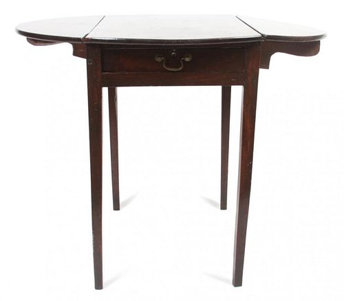 An English Drop-Leaf Table Height 27 3/4 x width 36 (open) x depth 30 inches.
