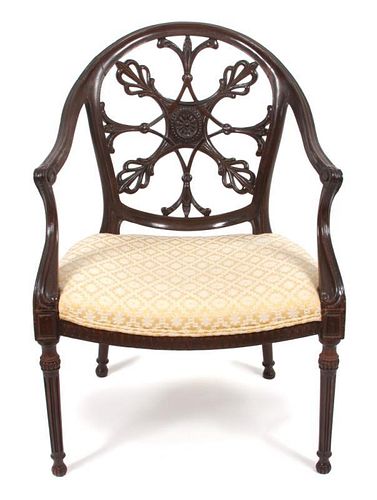 An English Carved Armchair Height 35 1/2 inches.