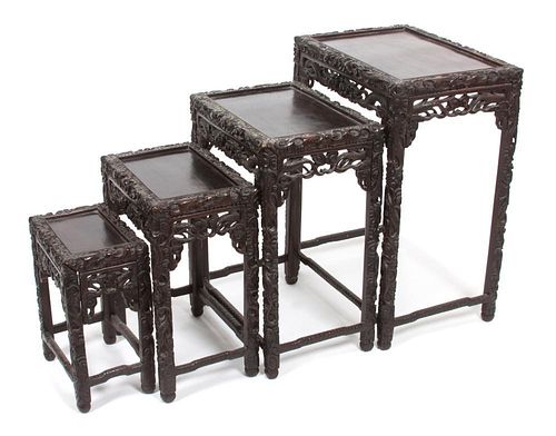A Group of Four Asian Nesting Tables Height of tallest 28 1/2 inches.