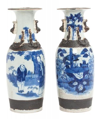 A Pair of Porcelain Asian Vases Height 11 3/4 x diameter 4 1/2 inches.