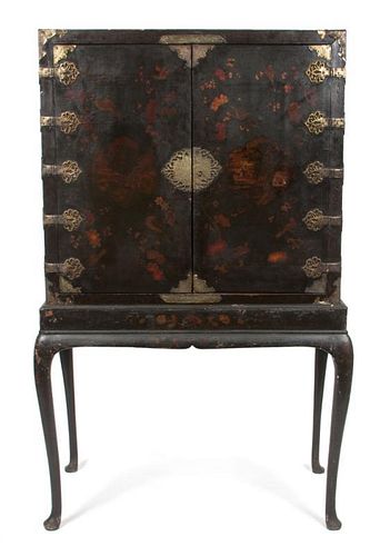 An Asian Chest on Stand Height of chest 35 x width 38 1/2 x depth 22 inches.; Height overall 66 1/4 inches.