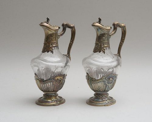 PAIR OF CONTINENTAL CUT-GLASS CLARET JUGS WITH SILVER-PLATED MOUNTS