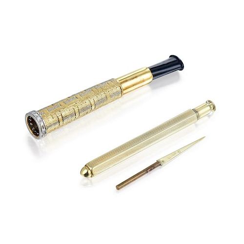 A Gold Toothpick and a Gold and Diamond Cigarette Holder