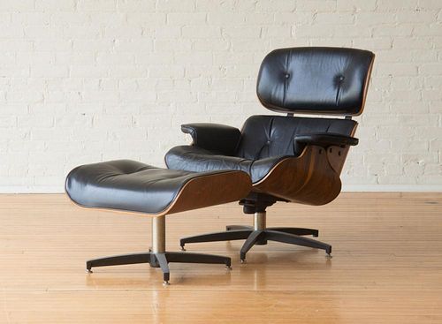 LEATHER, VINYL AND ROSEWOOD VENEER ARMCHAIR AND OTTOMAN, STYLE OF CHARLES AND RAY EAMES