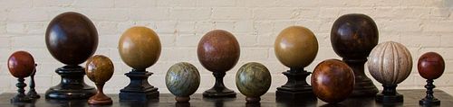 GROUP OF TWELVE DECORATIVE MARBLE, STONE AND WOOD ORBS