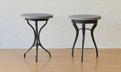 TWO CAST-IRON STONE-TOP GARDEN TABLES