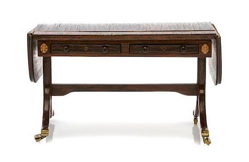 A Regency Style Rosewood Sofa Table, Height 2 1/2 x width 4 x depth 2 inches.
