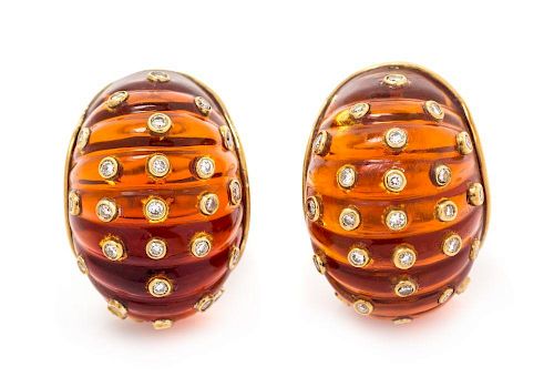 A Pair of Yellow Gold, Diamond and Amber Earclips, 15.60 dwts.