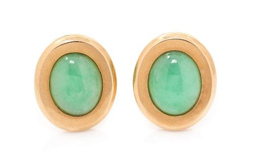 A Pair of 14 Karat Yellow Gold and Jade Earclips, 5.40 dwts.