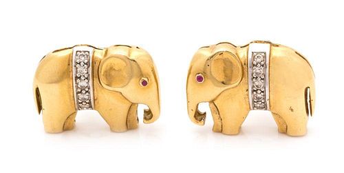 A Pair of 18 Karat Bicolor Gold, Diamond and Ruby Elephant Motif Earclips, 8.60 dwts.