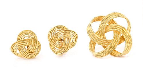 An 18 Karat Yellow Gold Knot Motif Jewelry, 24.10 dwts.