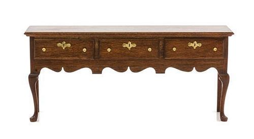 An English Provincial Style Mahogany Sideboard, Height 2 7/8 x width 6 1/2 x depth 1 3/4 inches.