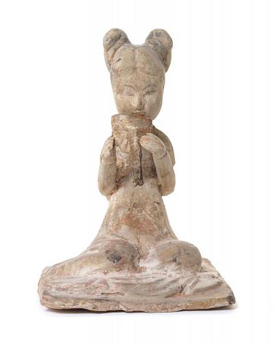 A Pottery Figure of a Female Musician
