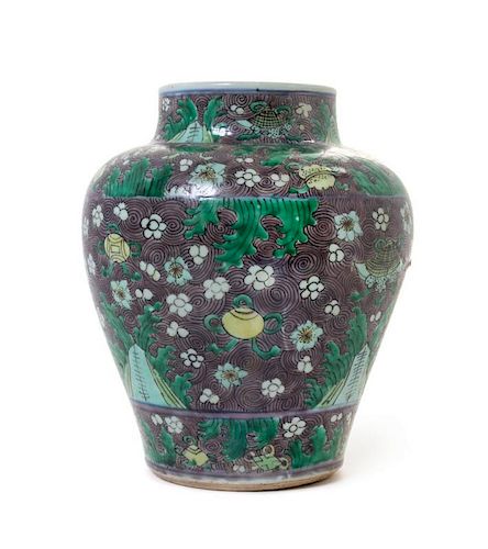 An Aubergine and Famille Verte Porcelain Jar