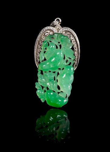 An Apple Green And Celadon Jadeite Pendant Length 1 3/4 inches.