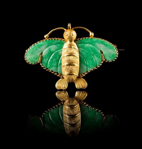 A Jadeite and Gold Mounted 'Butterfly' Brooch Length 1 1/2 inches.