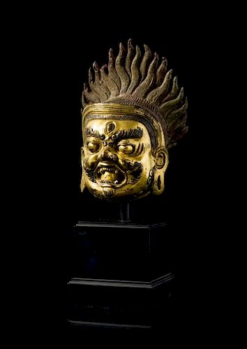 A Sino-Tibetan Gilt Bronze Head of Bodhisattva Mahakala