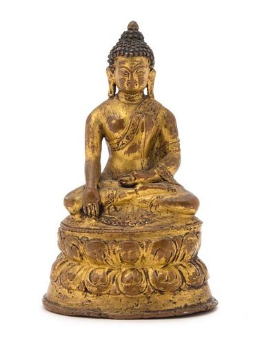 A Gilt Bronze Figure of Buddha Height 4 1/4 inches.