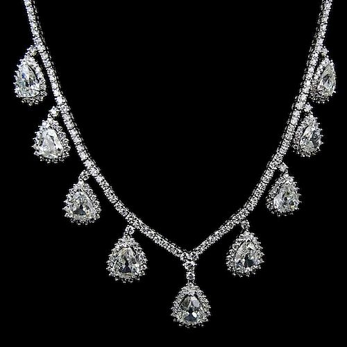 16.0 Ct Diamond and 18 Kt White Gold Necklace set with Nine (9) Pear Shape Diamonds weighing  9.81 Carats and 6.19 Cara