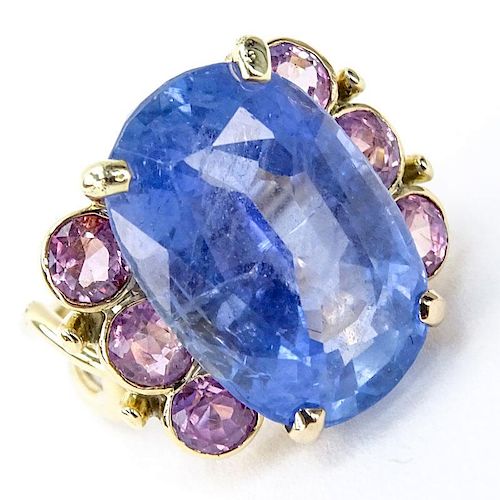 Approx. 30.0 Carat Oval Cut Natural Unheated Sapphire, 1.50 Carat Round Cut Pink Sapphire and 18 Karat Yellow Gold Ring.