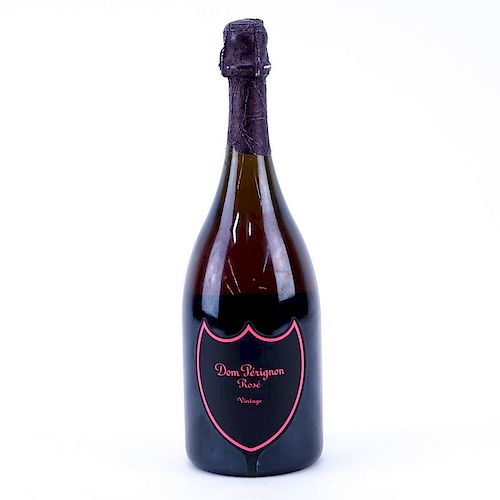 Vintage 2003 Dom Pérignon Rosé Champagne Bottle with Luminous Label. In unopened condition.
